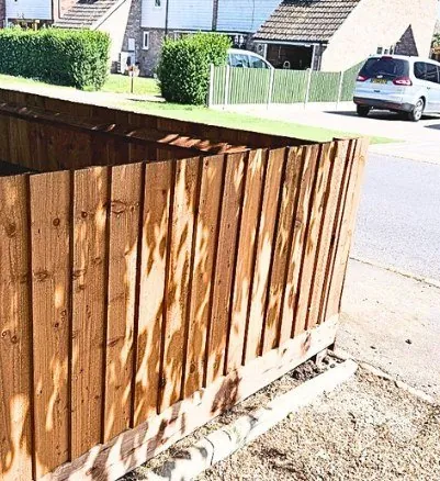 New close board fence on the same front boundary after installation
